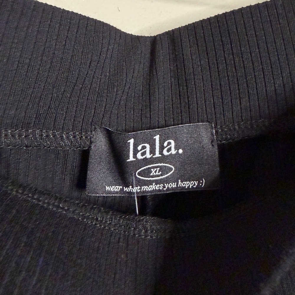 Dressed in Lala Gigi Sleeveless Ribbed Playsuit in Black - Picture 9 of 10